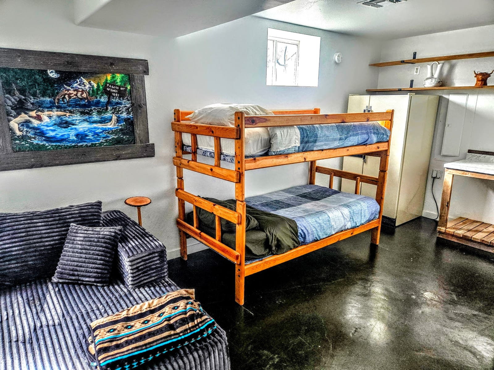 Basement bunk · river mural